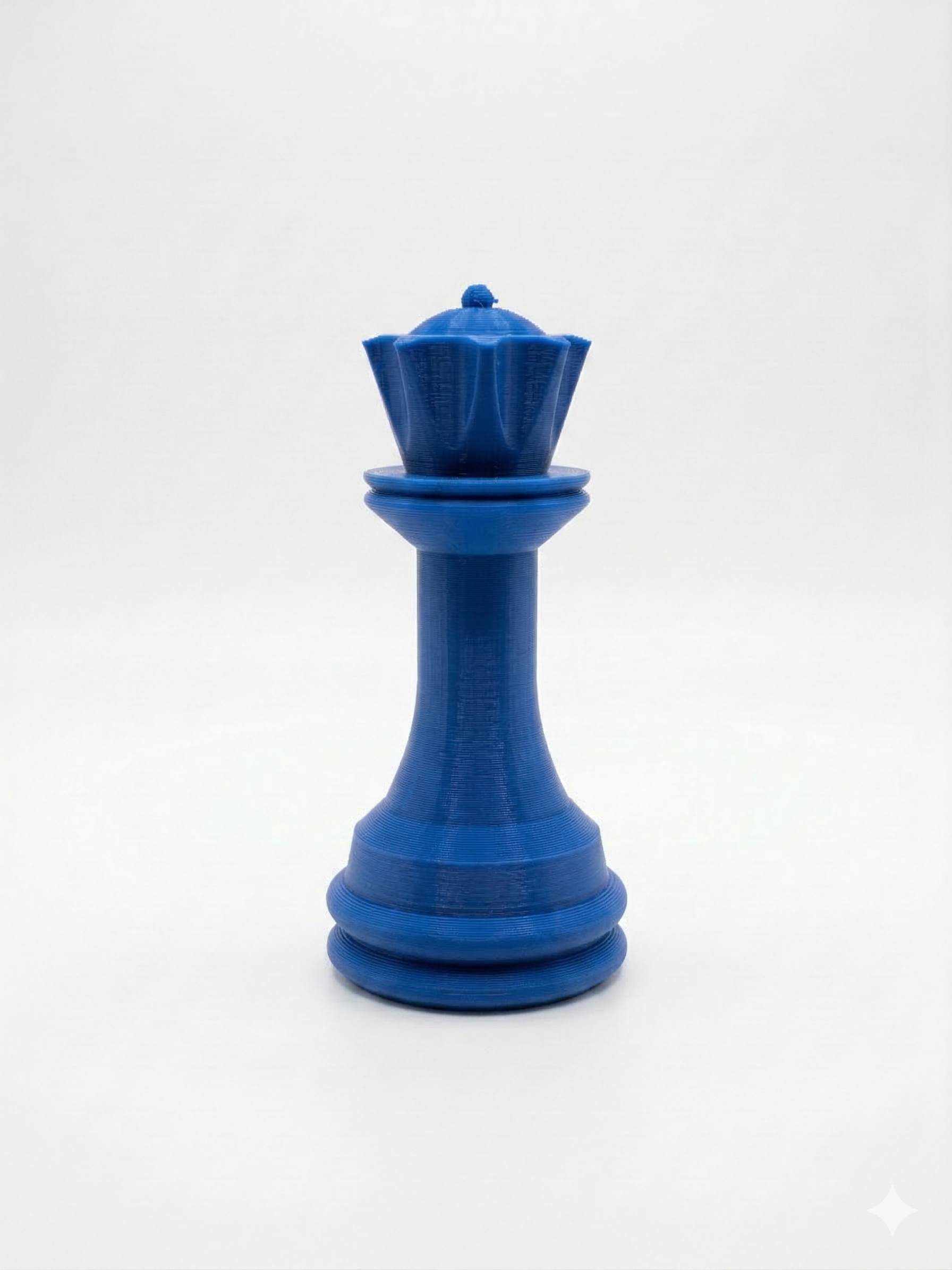 Ejemplo de una reina impresa en PLA azul.